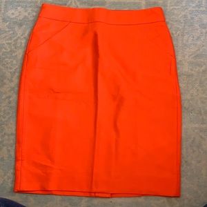 Orange J Crew pencil skirt.  NWT.   Size 2.  Pockets.